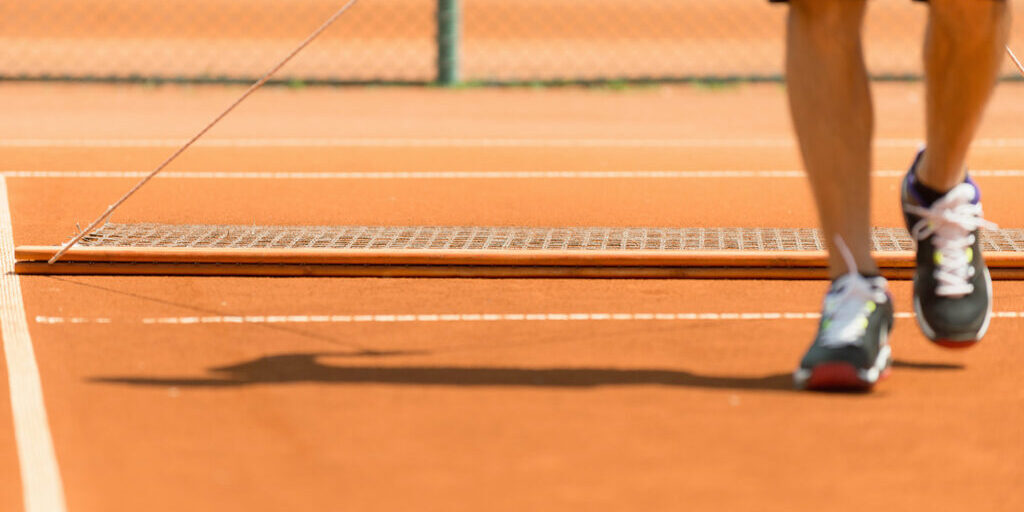 Tennis court grooming